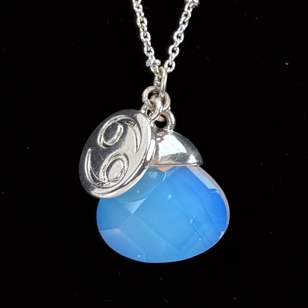 Vintage Silvertone Avon 69 iridescent charm necklace